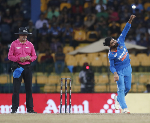 Asia Cup: Bowlers help India defend small total, end Lanka’s 13-ODI win streak; seal spot in final